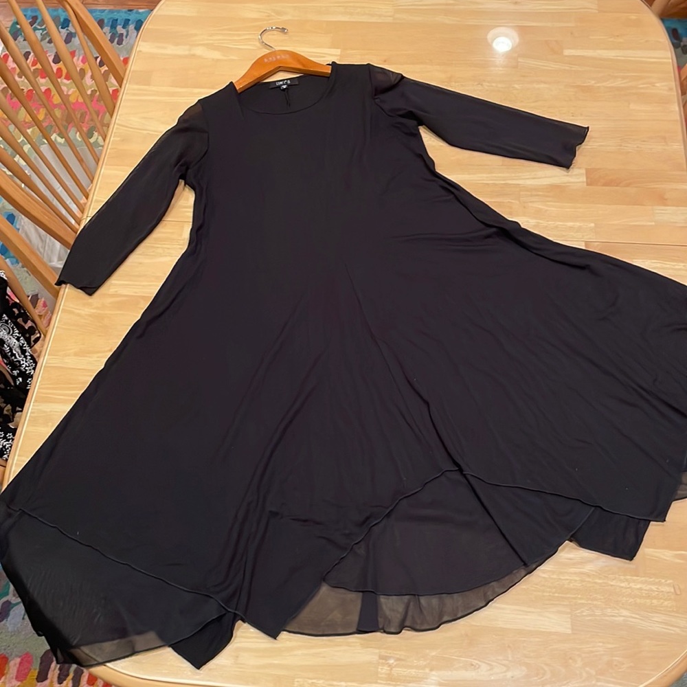 Comfy black maxi dress. Irregular bottom. Size M.